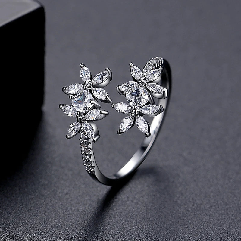 AURA Adjustable Flower CZ Ring – Elegant Zircon Claw Setting Jewelry for Women