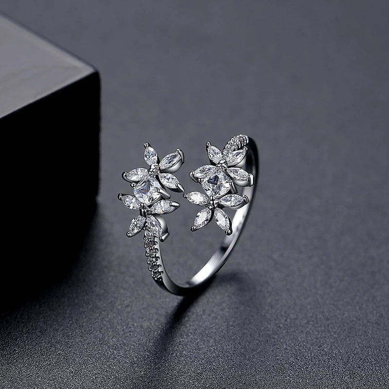 AURA Adjustable Flower CZ Ring – Elegant Zircon Claw Setting Jewelry for Women